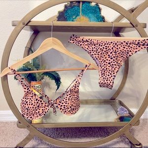 Size medium bathing suit two-piece cheetah print.